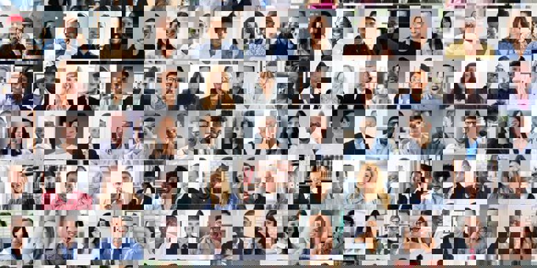 A picture of a group of people looking up to the camera